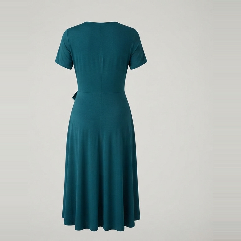 Back of the teal wrap dress concept, with short sleeves, a defined waist and a below-knee flared skirt.