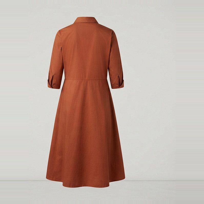 Shirt dress belted at the natural waist, back view