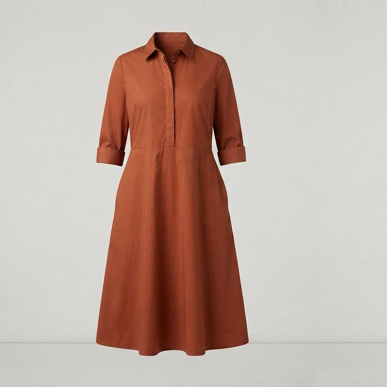Shirt dress belted at the natural waist, front view